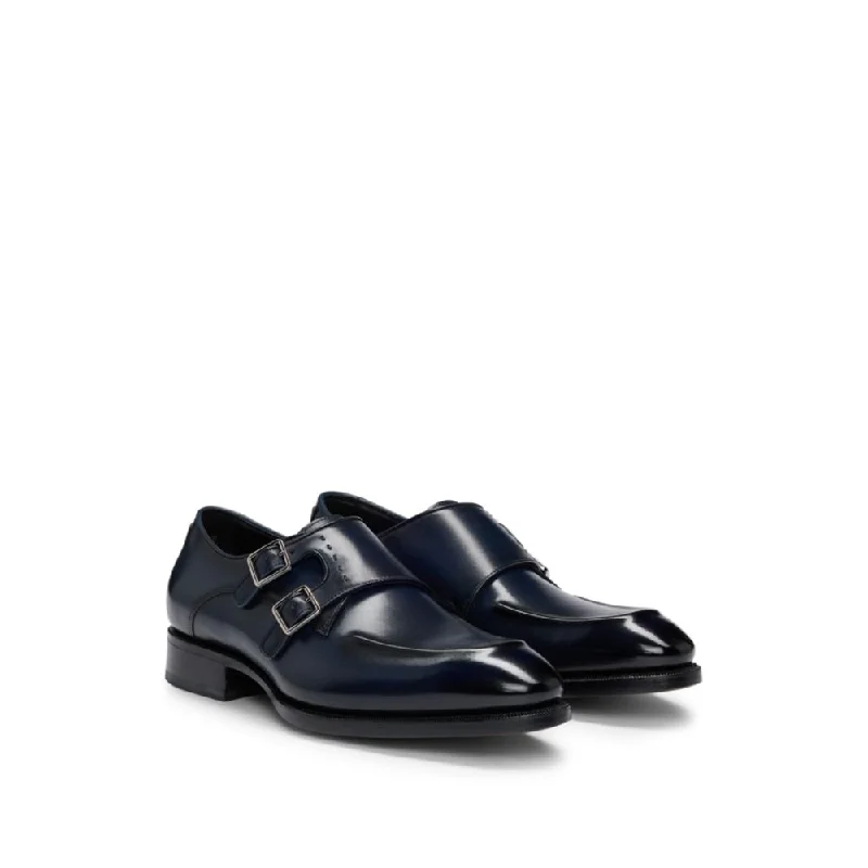 Double-strap monk shoes in leather with heel detail